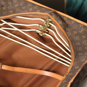 Sold Pre-Loved Paris-Purchased Foldable Louis Vuitton Garmet Bag with LV Hangers